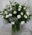 Flower arrangements with carnations,daisies and roses at Twiggs Florist JHB image 2