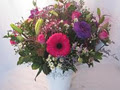 Flower arrangements with carnations,daisies and roses at Twiggs Florist JHB image 4